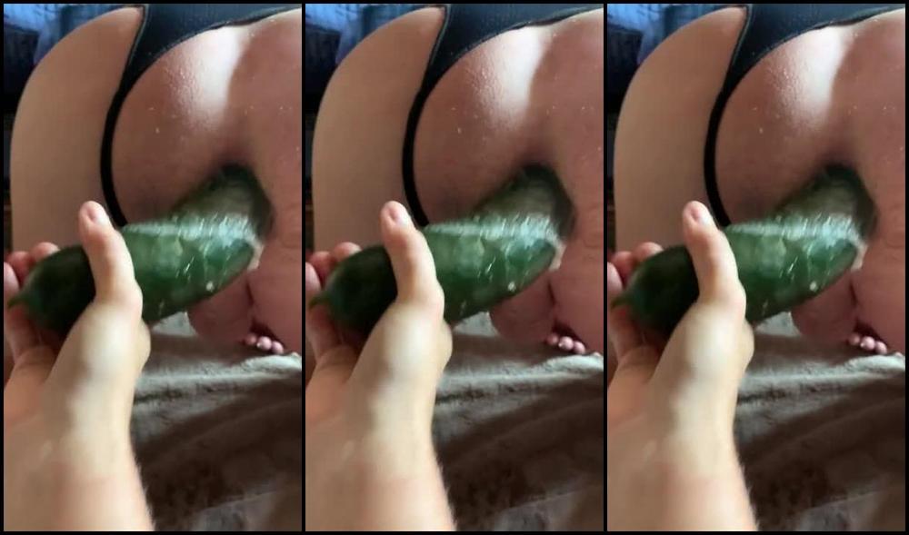 My cuck cums all over while I fuck his gaped ass hole with a fat cucumber!