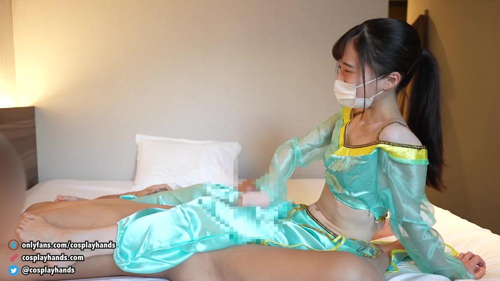 Japanese girl dressed as Arabian gives a guy a footjob