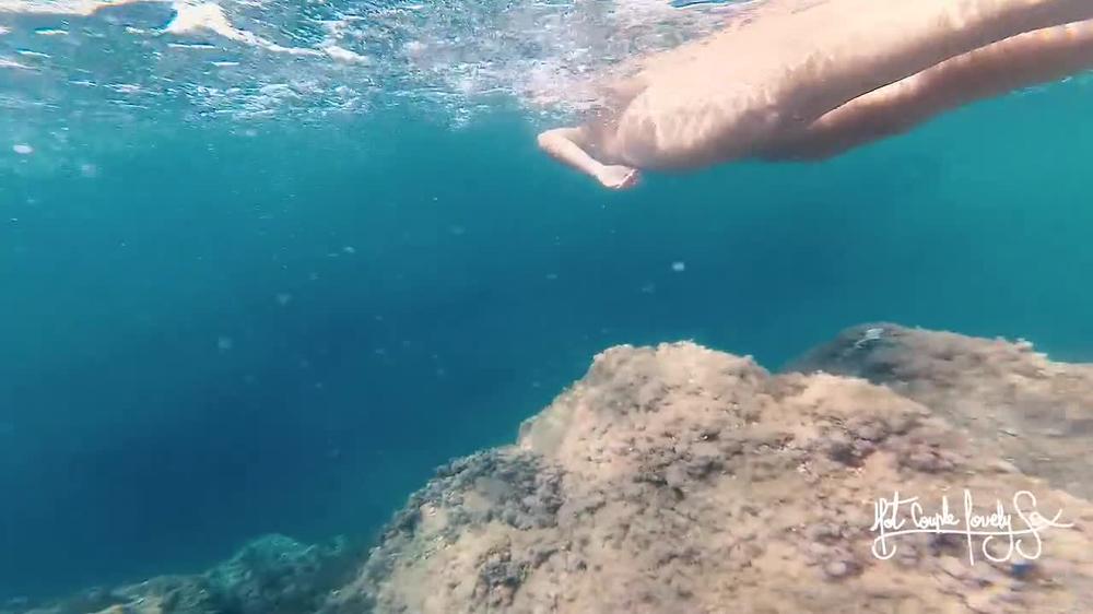 Naked adventures! Underwater sex games on a public beach ends in ruined orgasm.