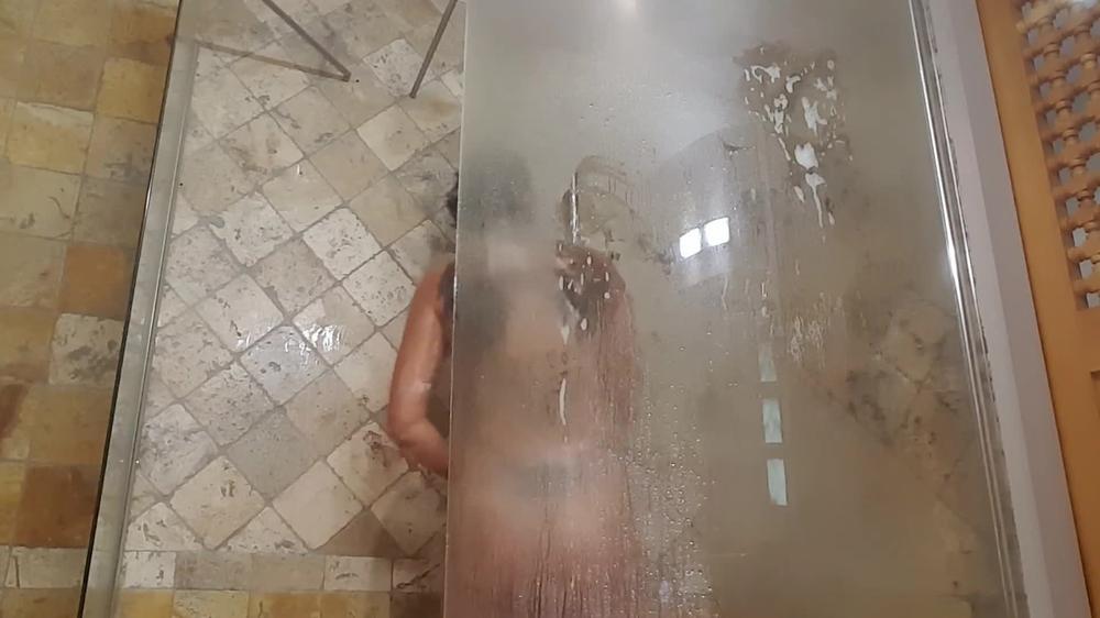 watch brunette teen under shower in hotel by Vic Alouqua