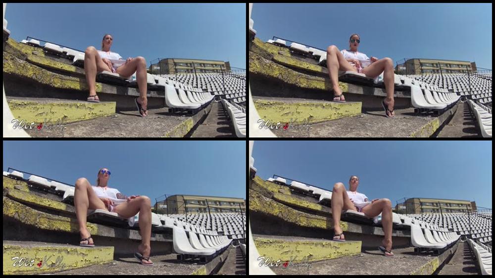 Wet Kelly Masturbation On A Soccer Stadium