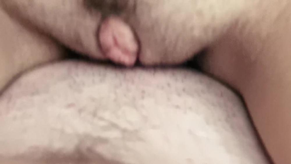 The girl in shorts panties and masturbates vibrator.
