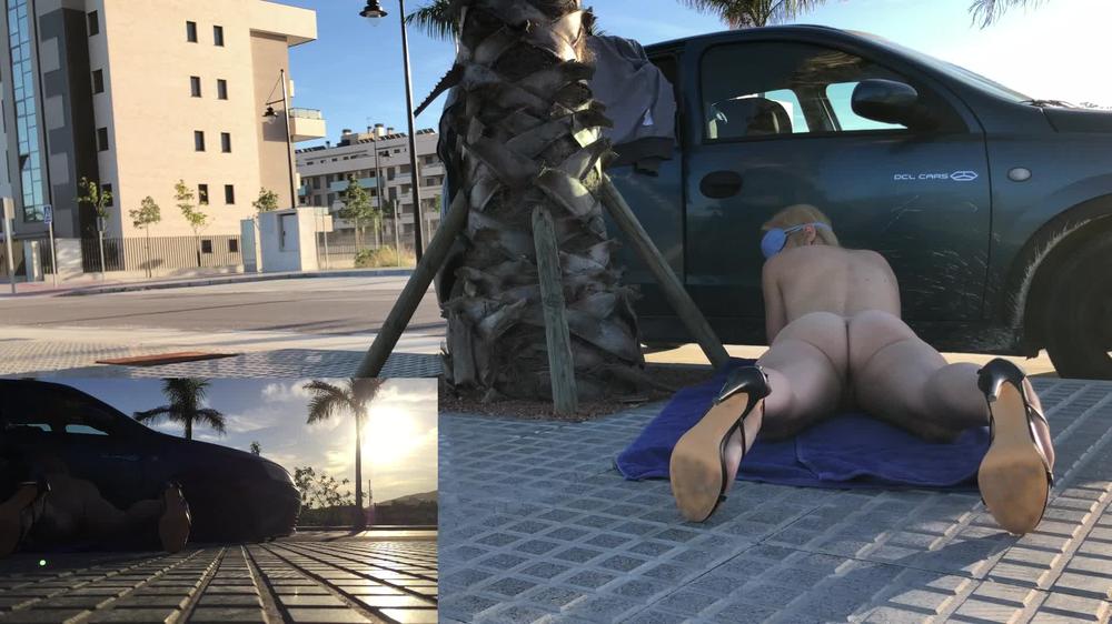 Laying Blindfolded In Sidewalk