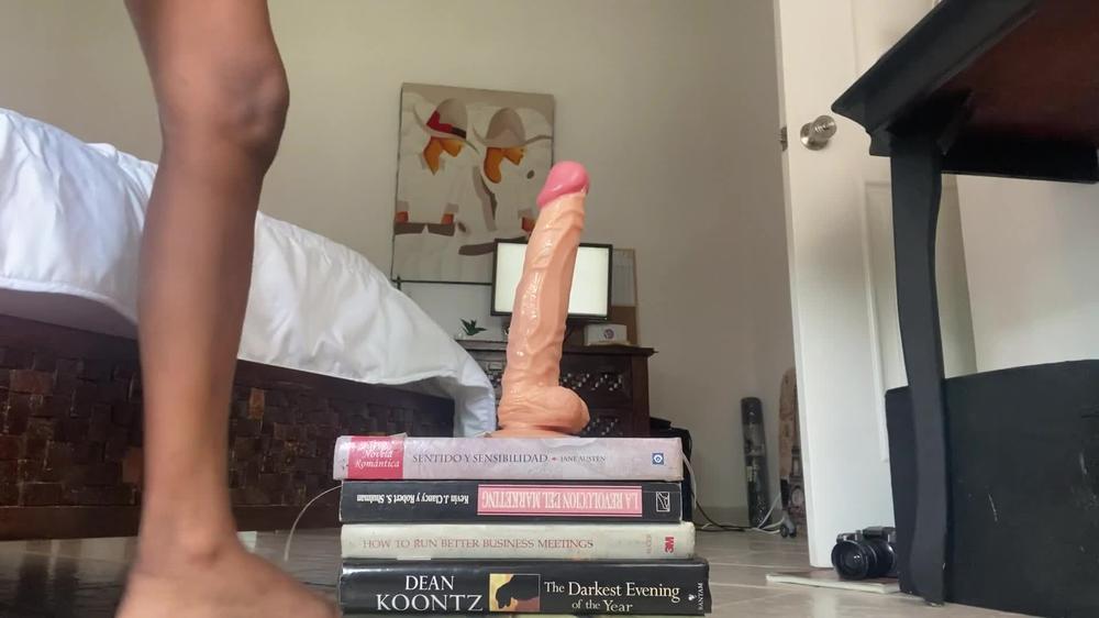 Nahomy fucks dildo in Books