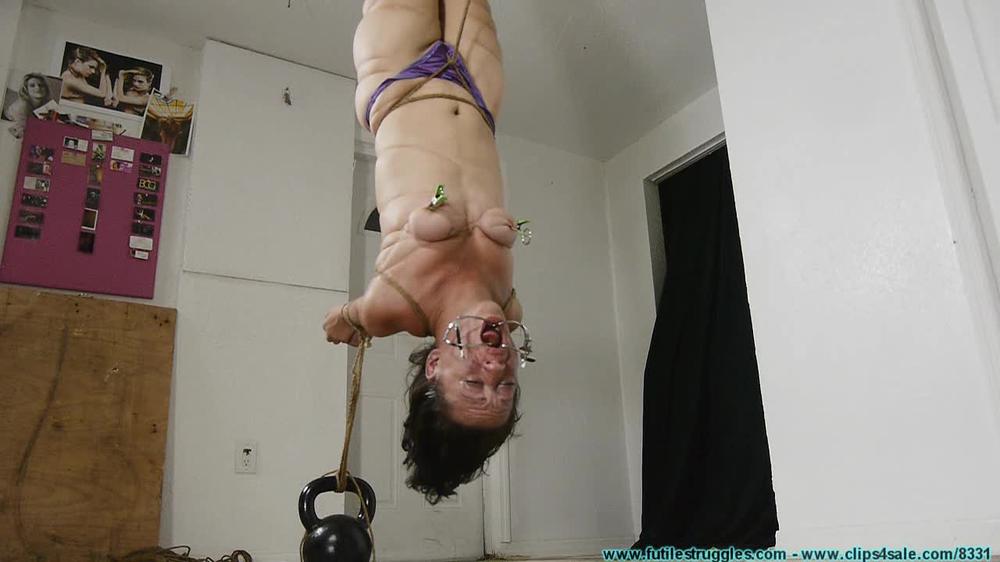 Hanging Upside Down Bound With Fishing Line