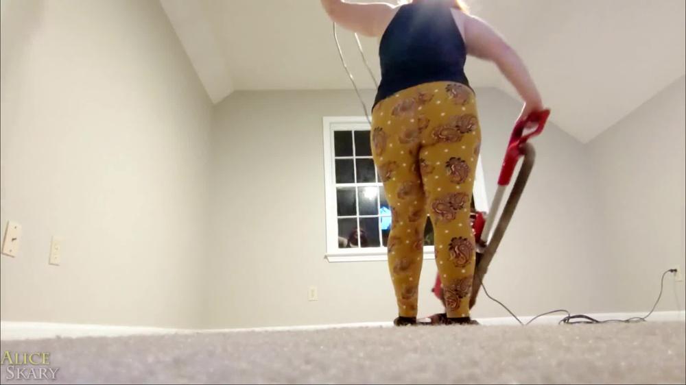 Vacuuming in Leggings