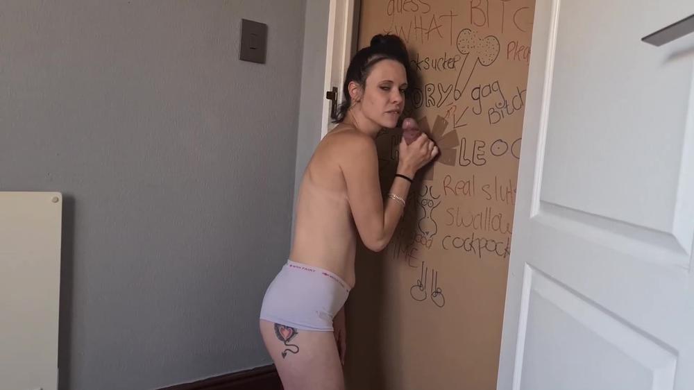 Gloryhole slut sucks and jerks my dick to get through doorway