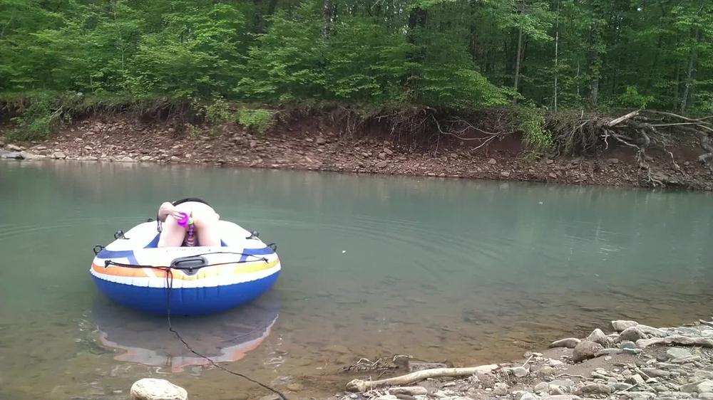 Masturbating at the creek in a raft