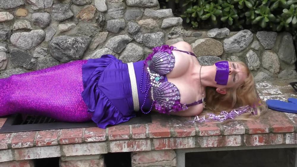 Captured Mermaid Lorelei Bound On The Grill