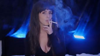Smoking 100s On Bed Close Up