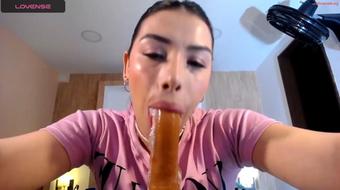 Drenched dildo manipulation sparks her deep throat journey