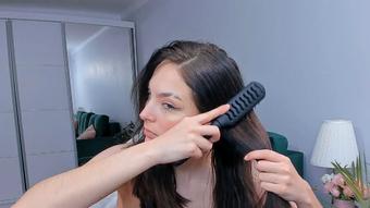 cute teen brushing her hair - Jan 9, 2023