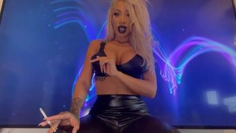 Smoking in rubber with black lips and hu
