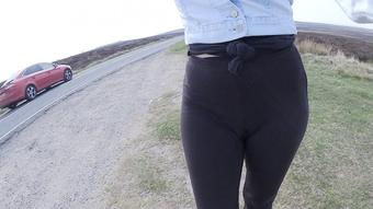 Black leggings peeing in the road - June 11, 2019