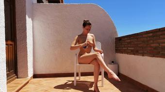 Morning sun lotion nude outside