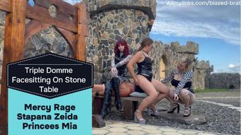 Triple Domme Facesitting on Stone Table
