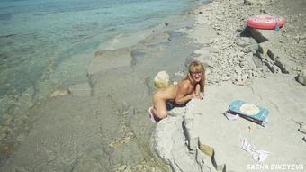 FREE VIDEO - Awesome kinky nudist girl in the public beach - Sasha Bikeyeva