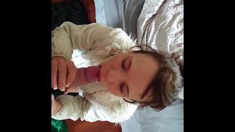 Girl in fur coat sucking and jerking dick gets cum all over her mouth