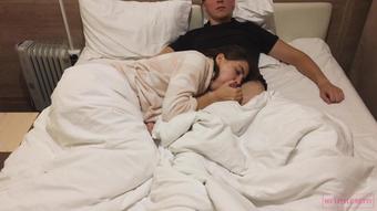 Hottie gives a relaxing home blowjob while watching a movie