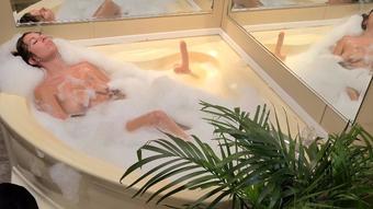 Kitty takes a bath with a friend