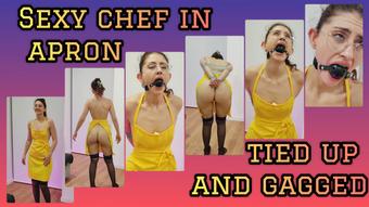 STUNNING BRUNETTE SEXY APRON FETISH BALLGAGGED TAPE BONDAGE