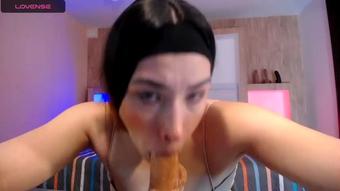 Intriguing Oral Play: A Massive Dildo and Lots of Saliva
