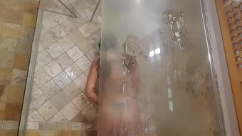 watch brunette teen under shower in hotel by Vic Alouqua