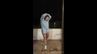 TEEN PLAYING IN THE RAIN, WET WET WET
