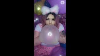 Schoolgirl Kitten blows heart balloon - October 29, 2021
