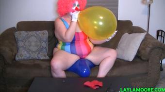 Clown Girl Blows & Sit Pops Big Balloons