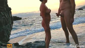 Handjob and Masturbating to eachother on Public Beach