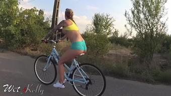 Kinky Girl Girl Riding Bicycle Topless On The Streets. Wetkelly