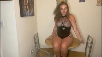 Teen in PVC Masturbates on Table