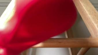 Ebony Removes Red Nylons On A Stool