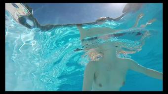 Selfie video having fun nude in the pool