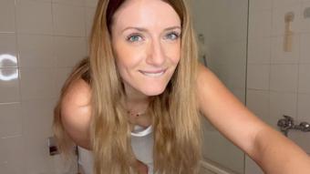 Toilet fetish on a white dress, heels and garters