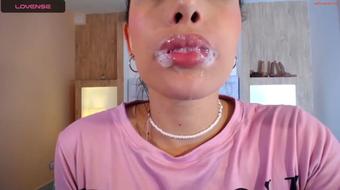Saliva-drenched dildo play fuels her deep throat expedition