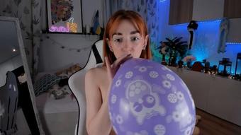 Blowing pink Balloon - Jun 21, 2023