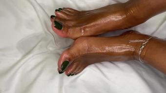 Ebony Girl Pours Oil All Over Her Feet