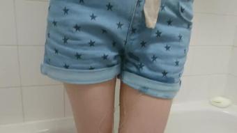 Little Girl Wets Her Denim Shorts