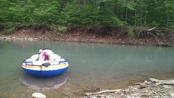Masturbating at the creek in a raft