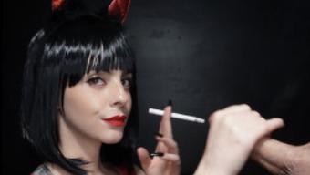 Smoking She Devil Strokes Cock