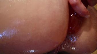 Pulsating anal gapes. Butt plug. Close up ass play. Big ass all oiled. Tight hole