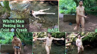 WHITE MAN PEEING IN A COLD CREEK