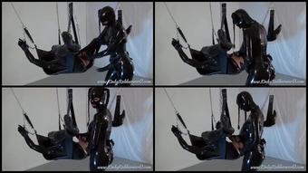 Black Lara Is Strapon Fucking Her Slave On The Swing