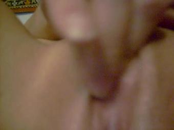 Busty Babe Masturbating Her Shaved Pussy On Bed