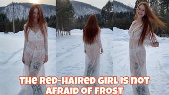 The red-haired girl is not afraid of frost