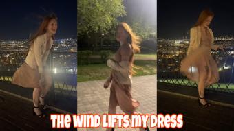 the wind lifts my dress
